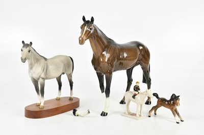 Lot 141 - BESWICK; three models of horses, including an...