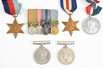 Lot 1426 - Four WWII medals comprising 1939-45 Medal, the...