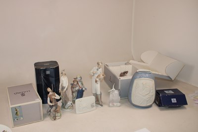 Lot 204 - LLADRO; a group of figures and related items,...