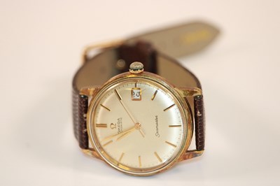 Lot 424 - OMEGA; a gentleman's vintage automatic...