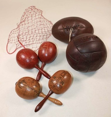 Lot 63 - A vintage leather rugby ball, a vintage...