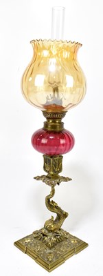 Lot 1537 - A 19th century gilt brass peg lamp