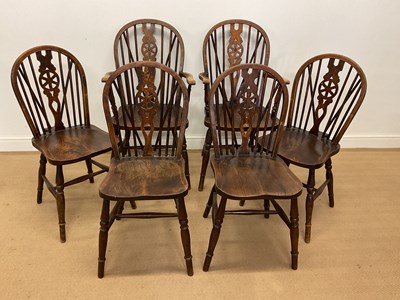 Lot 530 - A set of six beech and oak wheel back chairs,...