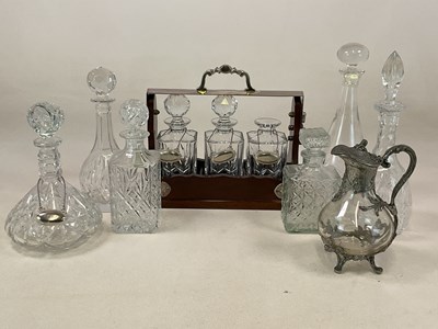 Lot 227 - A modern oak tantalus with three decanters,...