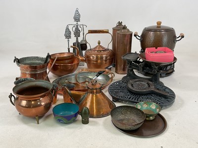 Lot 129 - A quantity of copper and cast iron items,...