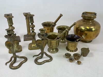 Lot 130 - A collection of brassware, comprising three...