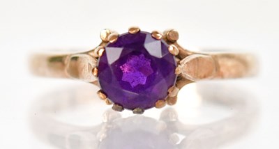 Lot 778 - A 9ct gold ring claw set with a circular...