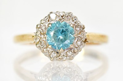 Lot 750 - An 18ct yellow gold cluster ring set with...
