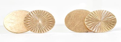Lot 901 - A pair of 9ct gold cufflinks of oval form, one...