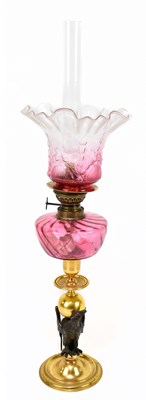 Lot 1538 - A 19th century gilt brass and bronze peg lamp