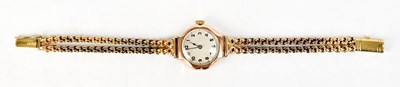 Lot 1011 - A 9ct gold ladies' wristwatch, the silvered...