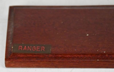 Lot 232 - A model of a single-masted sailing ship,...