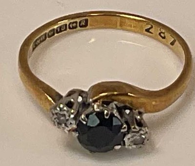 Lot 376 - An 18ct yellow gold sapphire and diamond three...