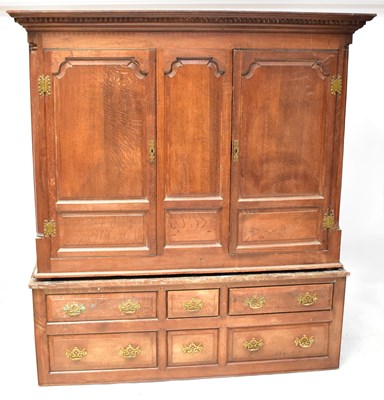 Lot 86 - An early 19th century oak housekeeper's...