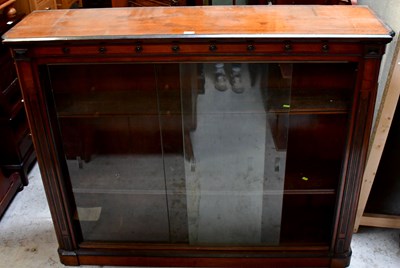 Lot 70 - A 19th century walnut bookcase with three...