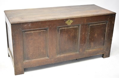 Lot 59 - A 19th century oak coffer with three-panel...