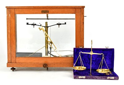 Lot 336 - An apothecary scale in glazed wooden case and...
