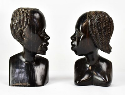 Lot 276 - Two carved African hardwood busts, carved as a...