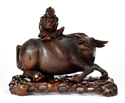 Lot 250 - A Chinese carved hardwood figure of a water...
