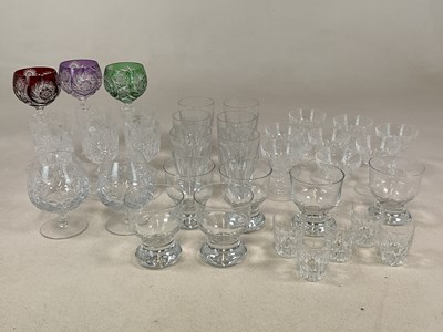 Lot 229 - A quantity of cut crystal drinking glasses,...