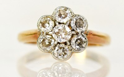 Lot 742 - An 18ct gold and platinum ring, in the form of...