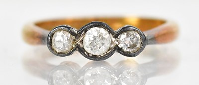 Lot 757 - An 18ct gold ring set with three graduated...