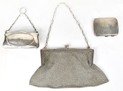 Lot 569 - Three silver purses, comprising a mesh purse...