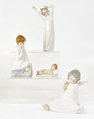 Lot 180 - LLADRÓ; four figures comprising a seated angel,...