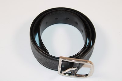 Lot 79 - GUCCI; a gentleman's black leather belt with...