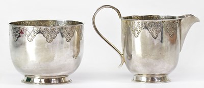 Lot 629 - A George V hallmarked silver matching sugar...