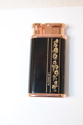 Lot 36 - THE ORIENT EXPRESS; a boxed lighter, with...