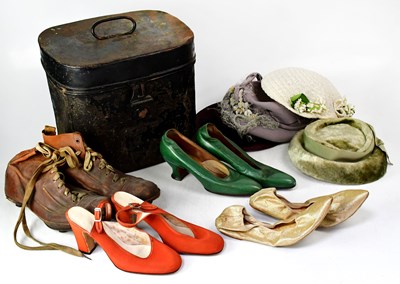 Lot 404 - A tin hatbox containing four vintage ladies'...