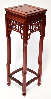 Lot 257 - A Chinese hardwood jardinière stand with...
