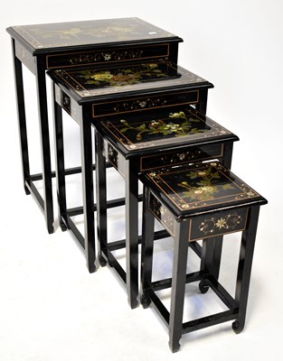 Lot 254 - A Chinese lacquerware quartetto, each table...