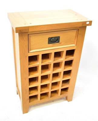 Lot 26 - An oak side cabinet/wine rack with single...