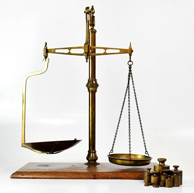 Lot 381 - A set of brass pharmaceutical scales, mounted...