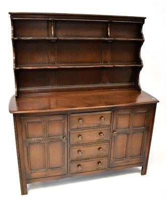 Lot 116a - ERCOL; a dark stained elm dresser, 148 x 145 x...