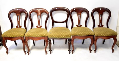 Lot 123 - Four Victorian mahogany balloon-back dining...
