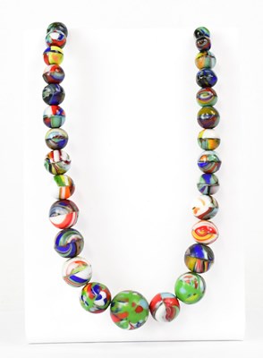 Lot 884 - A Czech multicoloured marbled Uranium glass...