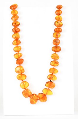 Lot 882 - A Baltic amber style beaded necklace with...