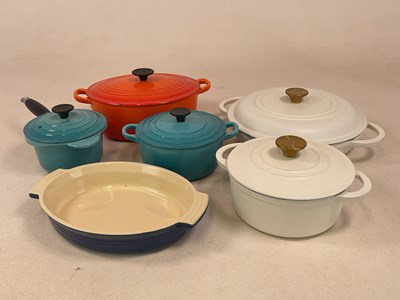 Lot 133 - LE CREUSET: three various cast iron pots with...
