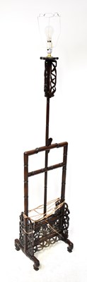 Lot 152 - A Chinese hardwood standard lamp, with carved...