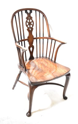 Lot 56 - A 19th century ash and elm wheel-back Windsor...
