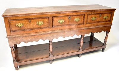 Lot 116 - A George III oak and crossbanded mahogany...