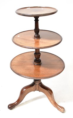 Lot 95 - A George III mahogany three-tier dumb waiter,...