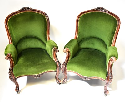 Lot 58 - A pair of Victorian walnut-framed armchairs...