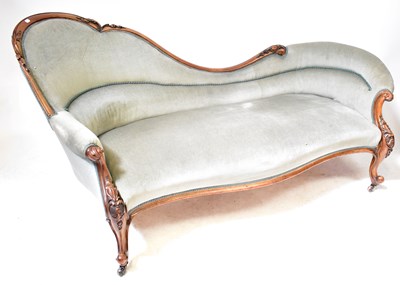Lot 54b - A Victorian carved walnut chaise longue with...