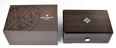 Lot 992 - PATEK PHILLIPE; a vacant lacquered fitted...