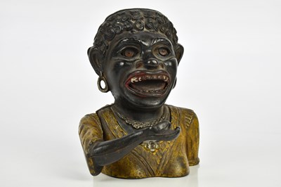 Lot 1278 - A cast iron 'Dinah' money box.