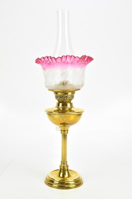 Lot 2416 - An early 20th century brass oil lamp, with...